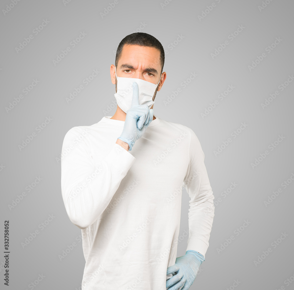 Coronavirus.Young man doing concepts and wearing mask and protective gloves Coronavirus.Young man doing concepts and wearing mask and protective gloves