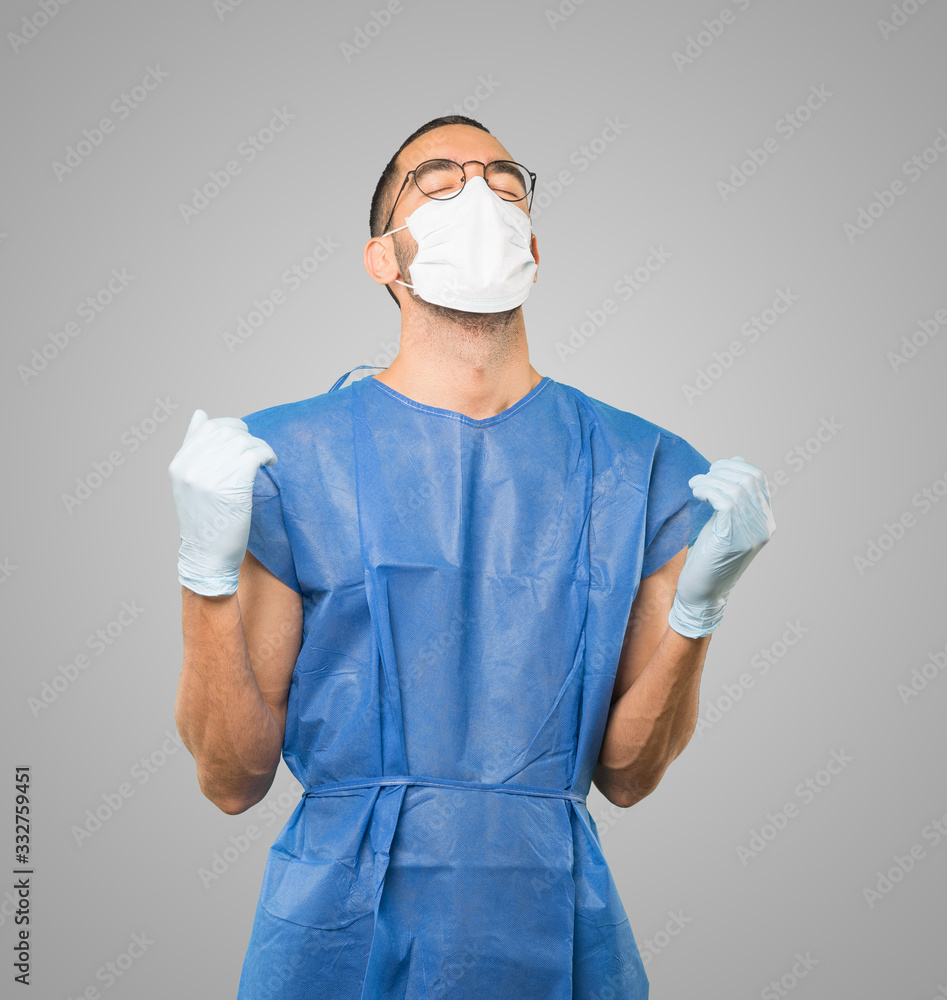 Coronavirus.Young man doing concepts and wearing mask and protective gloves Coronavirus.Young man doing concepts and wearing mask and protective gloves