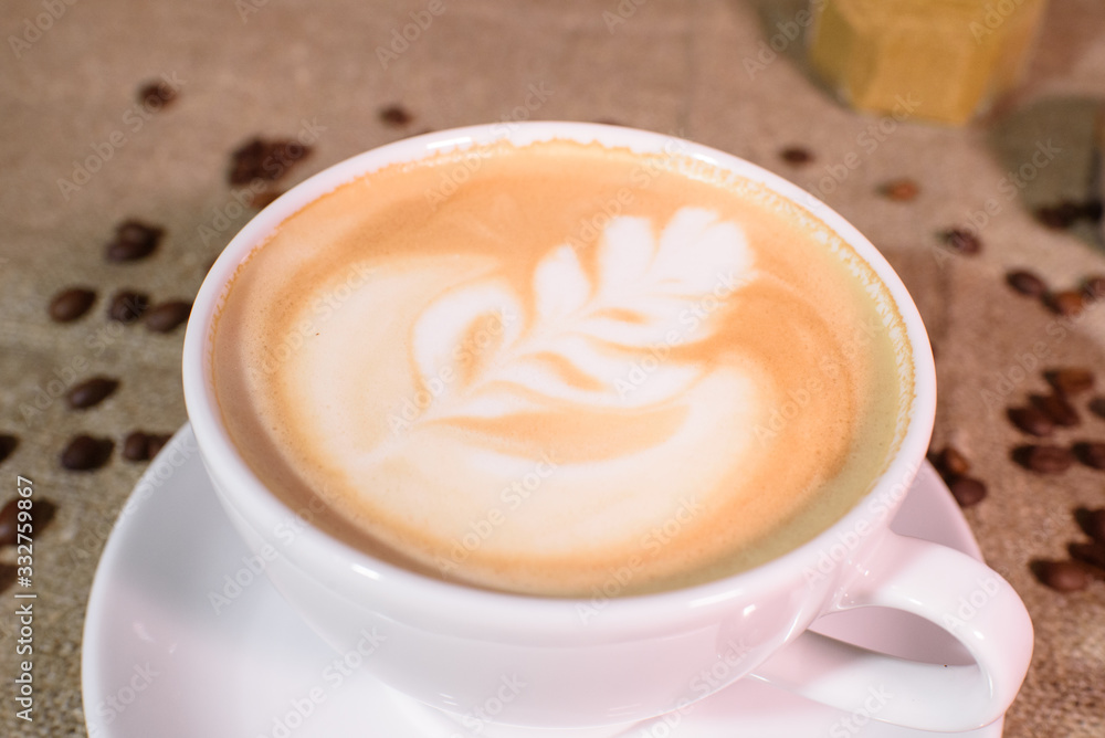 Tasty fragrant caupchino on a canvas background. Near the Turk and the holder. Tasty fragrant caupchino on a canvas background. Near the Turk and the holder.