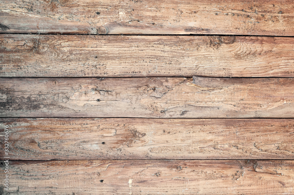 Background of aged rounded natural wood fence texture Background of aged rounded natural wood fence texture
