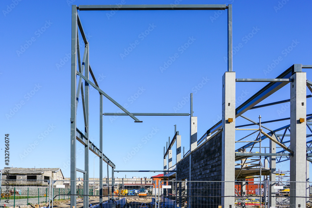 The steel frame of a building under construction The steel frame of a building under construction