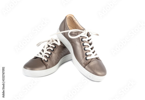 Shinny Brown Leather Sneakers With White Lace Isolated on White