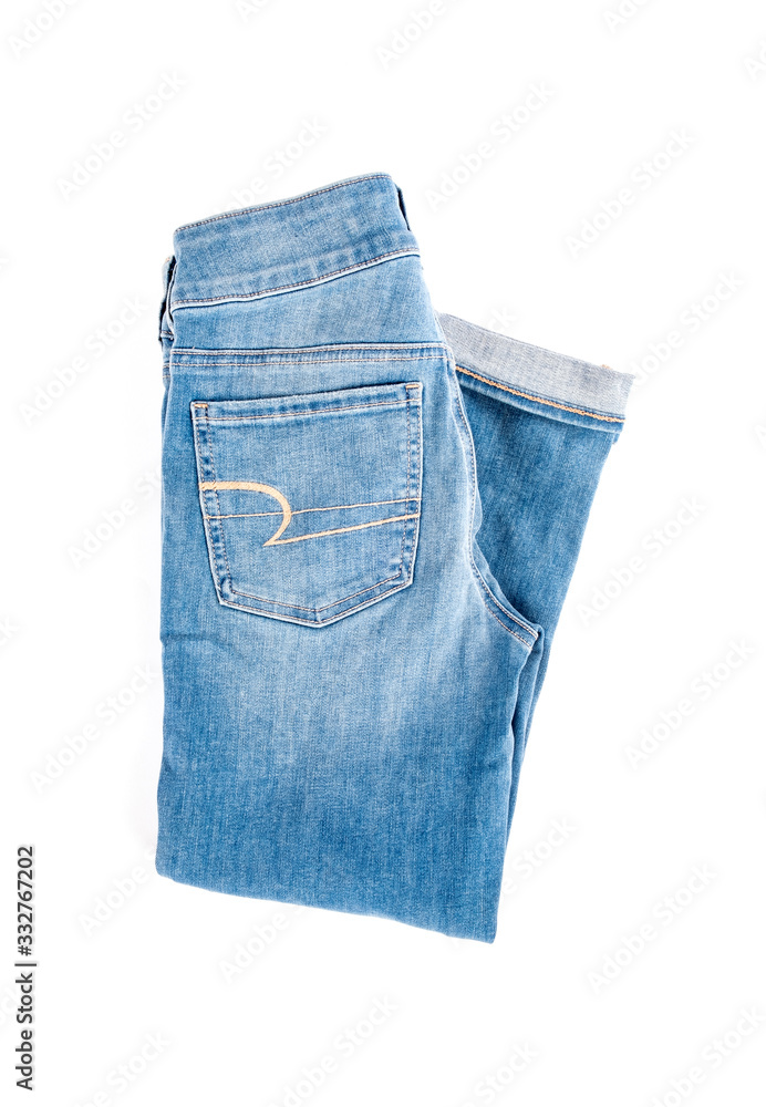 Women's Light Colored Cropped Denim Blue Jeans Isolated on White Women's Light Colored Cropped Denim Blue Jeans Isolated on White