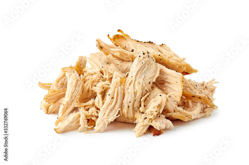 Heap of pulled chicken meat on white photo