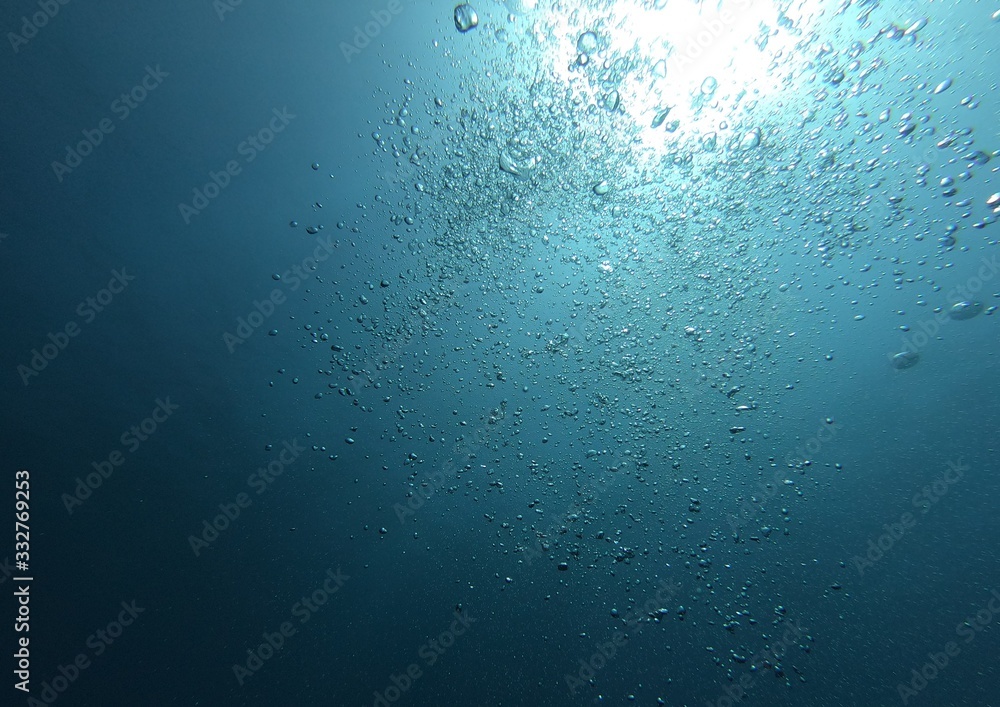 Bubble in the Blue Sea Underwater Ambiance, Sun light beams Bubble in the Blue Sea Underwater Ambiance, Sun light beams