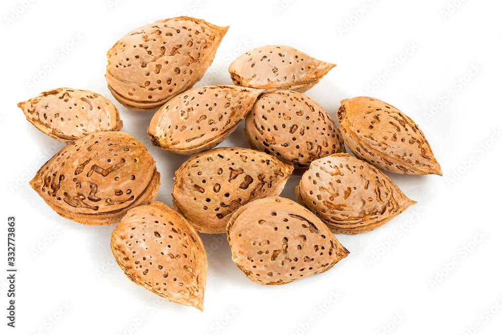 Almond seeds on a white background Almond seeds on a white background