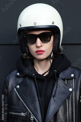 Close-up portrait of biker girl wearing white helmet.  © face_reader_img