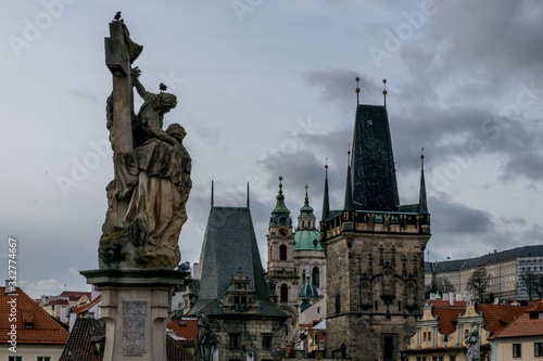 Statue of Lutgardis, Charles Bridge and Prague rooftops