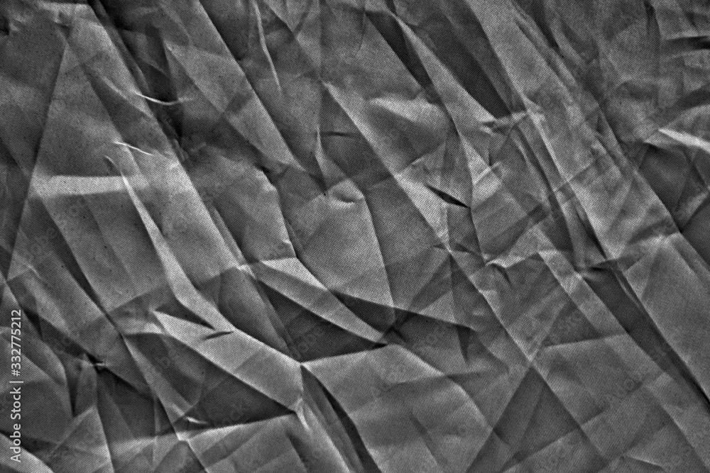 dark background: Crumpled fabric, black and white, enhanced contrast dark background: Crumpled fabric, black and white, enhanced contrast