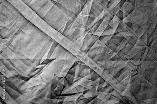 dark background  Crumpled fabric  black and white  enhanced contrast