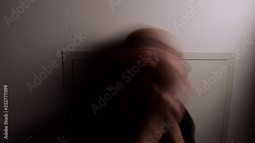 Time lapse of Segregated man going crazy. Segregation and isolation concept. Man in Quarantine. Depression concept. Caucasian depressed man