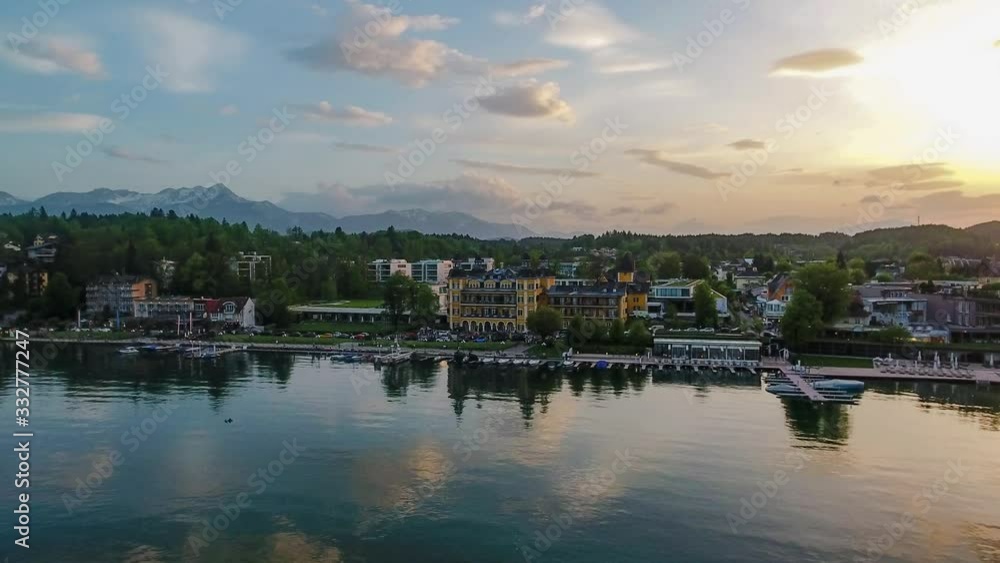 Aerial view panoramic drone of lake Worthersee, Austria mountain view on a sunny day in summer Aerial view panoramic drone of lake Worthersee, Austria mountain view on a sunny day in summer