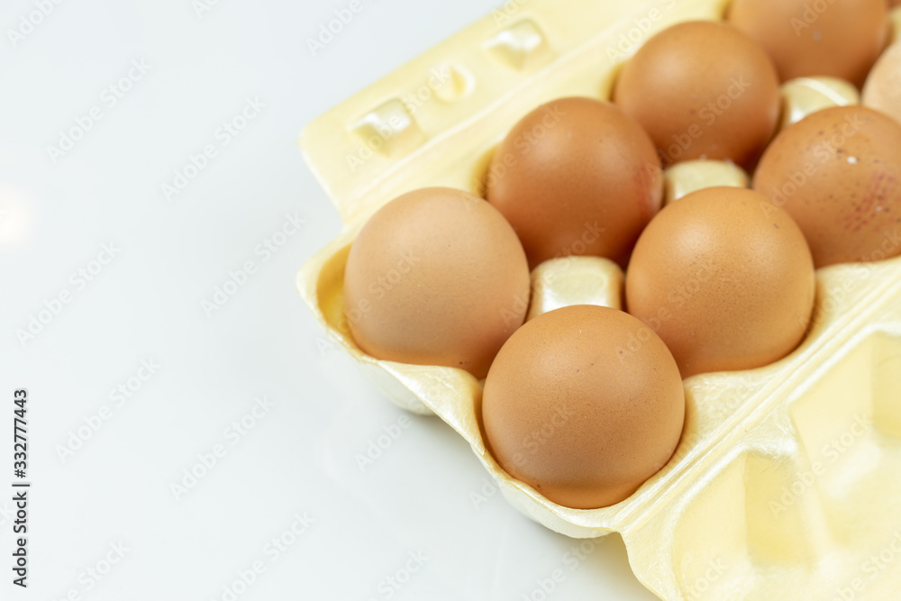 Full box with eggs isolated above white background with copy space Full box with eggs isolated above white background with copy space
