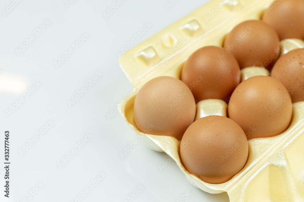 Full box with eggs isolated above white background with copy space Full box with eggs isolated above white background with copy space