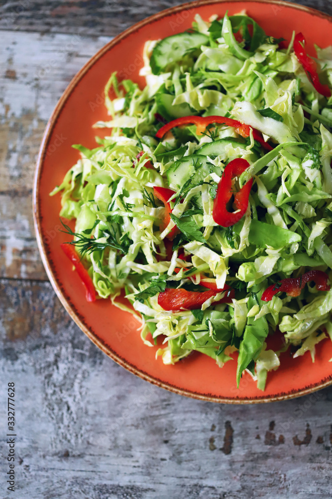Healthy vitamin salad with fresh cabbage. Spring salad with cabbage and herbs. Healthy diet. Immunity diet. Healthy vitamin salad with fresh cabbage. Spring salad with cabbage and herbs. Healthy diet. Immunity diet.