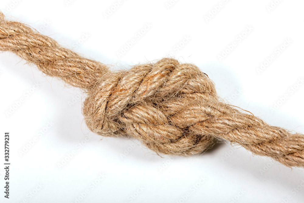 Close-up of a rope with a knot, on a white background