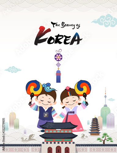 The Beauty of Korea. Korean traditional hanbok child couple character welcomes you to visit Korea with taegeuk fan. photo