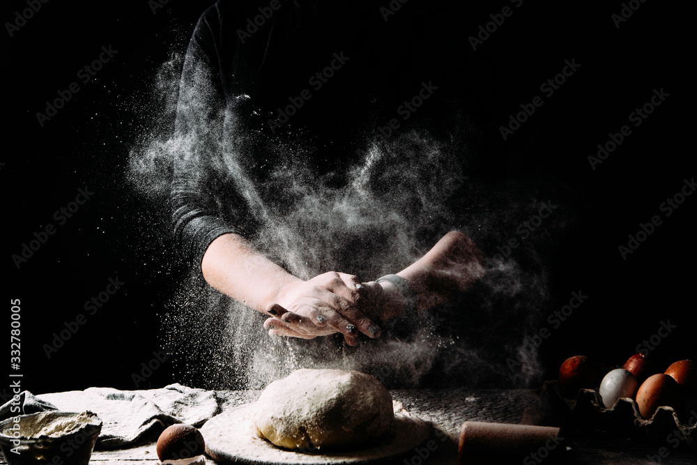 Flour.Cooking the dough. Photograph in a dark vein. 