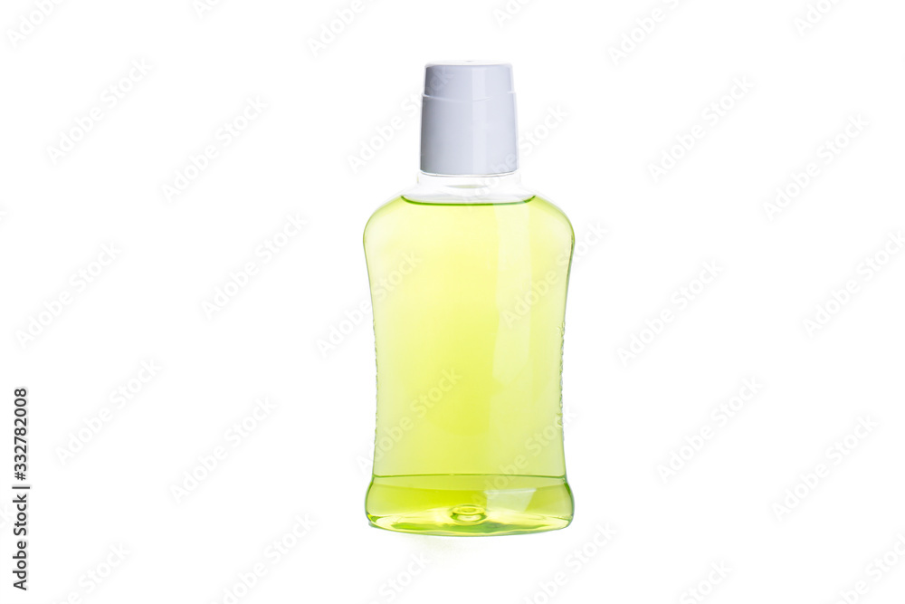Bottle of green mouthwash isolated on a white background. Bottle of green mouthwash isolated on a white background.