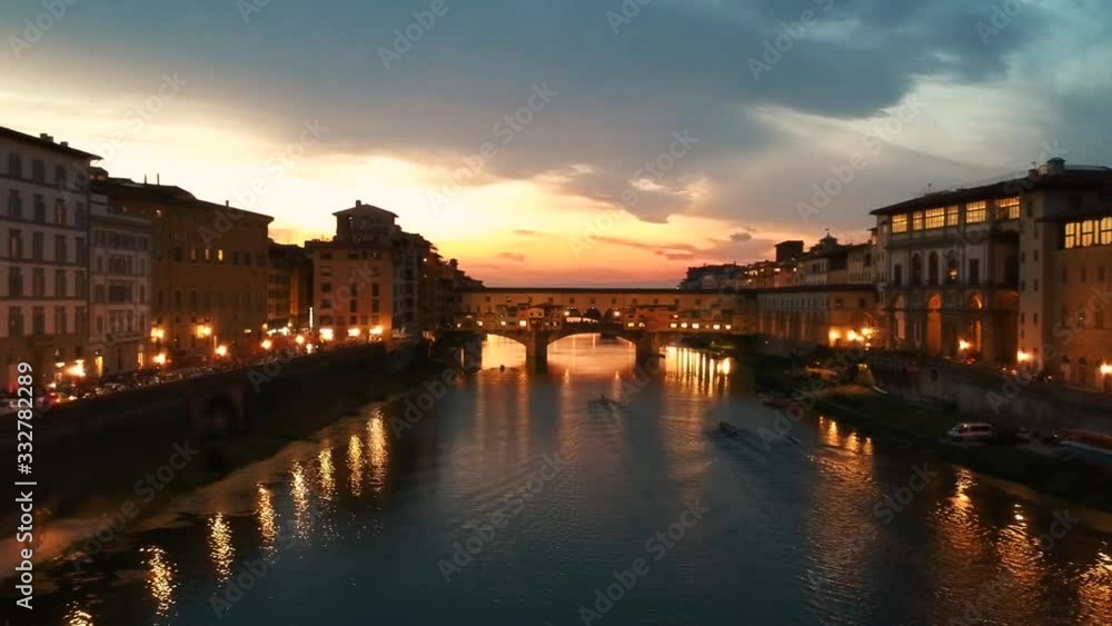 Aerial panoramic view of Florence Cathedral, Cattedrale di Santa Maria del Fiore and Ponte Del Vecchio in Firenze, Florence, Italy at dusk sunset Aerial panoramic view of Florence Cathedral, Cattedrale di Santa Maria del Fiore and Ponte Del Vecchio in Firenze, Florence, Italy at dusk sunset