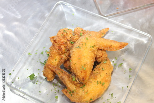 Fried Chicken Wings on a Glass Plate