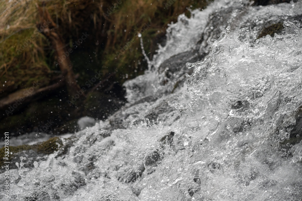 Small river cascade, Frozen motion, natural abstract texture background. Small river cascade, Frozen motion, natural abstract texture background.