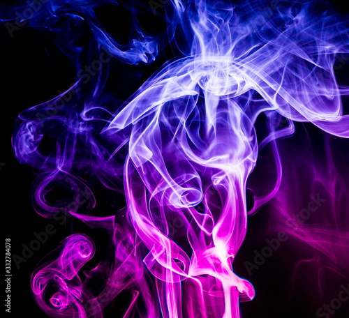 Colored smoke on black background