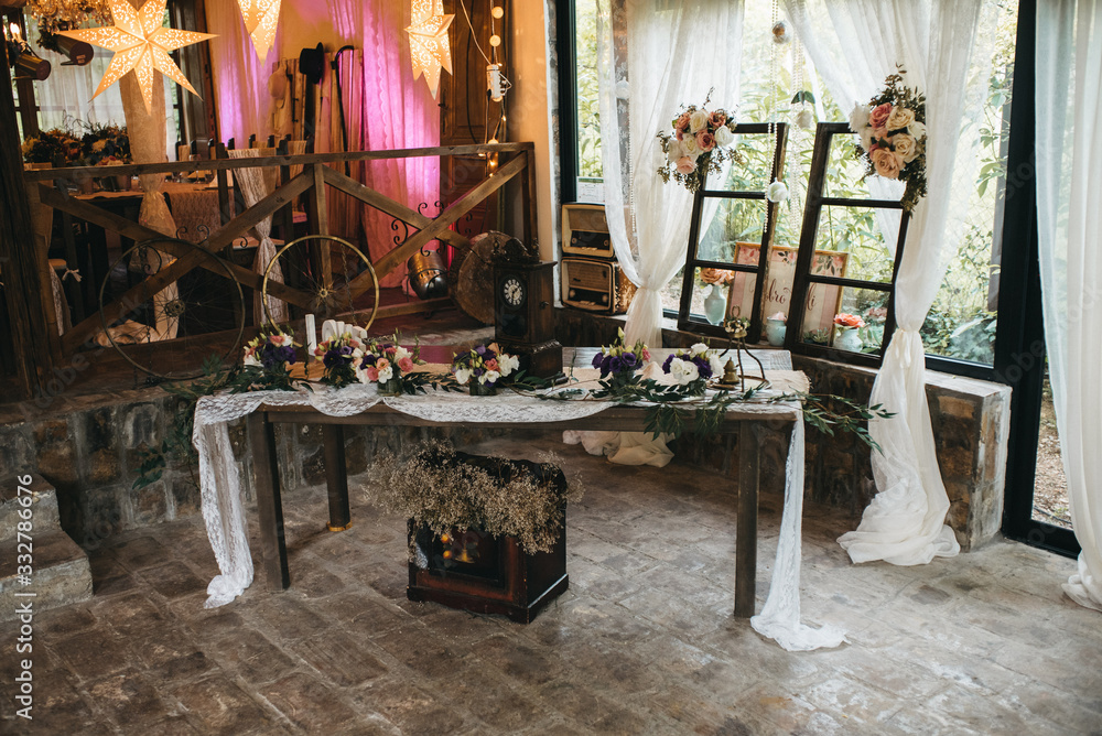 Decorated tables with candles and floral arrangements for celebration