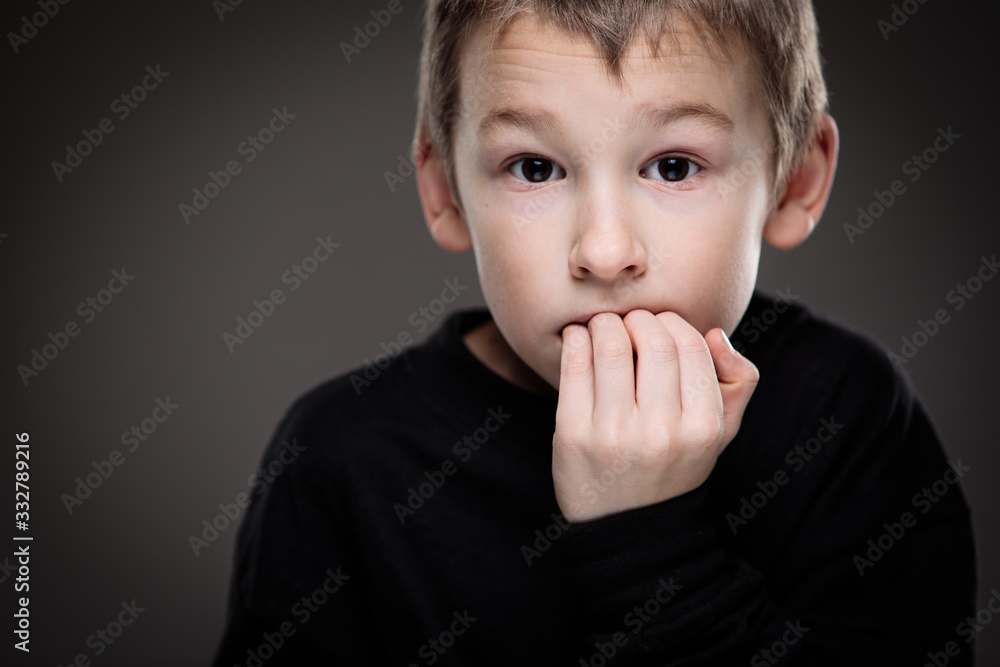 Anxiety/fear in a little boy - education concept hinting behavioral problems in young children (shallow DOF) - anxious/scared expression, biting his fingers Anxiety/fear in a little boy - education concept hinting behavioral problems in young children (shallow DOF) - anxious/scared expression, biting his fingers