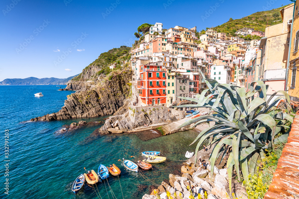 Boats and homes in Riomaggiore port, Five Lands, Italy