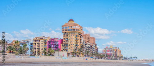 Port Sa Playa, Valencia, Spain - 3/19/2019: Bright sunny day panoramic photo looking at Port Saplaya, Valencia's Little Venice photo