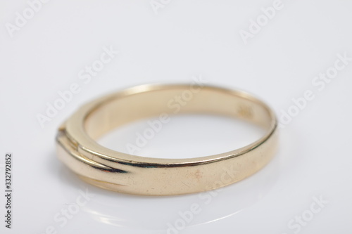 Macro shot of gold ring jewelry on an isolated background