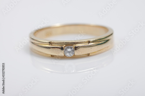 Macro shot of gold ring jewelry on an isolated background