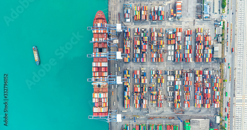 Container ship, Business logistic import-export transport international and transportation of containers in port , Shipping container buildings, Aerial at night view of Shipping container worldwide