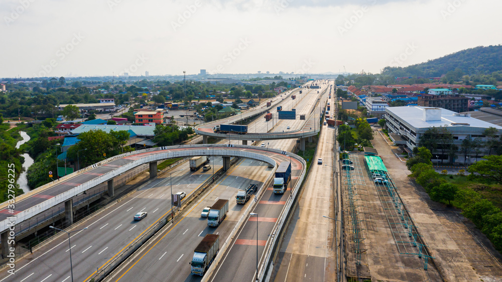 Naklejka premium U Turn. Road traffic on the industrial Thailand