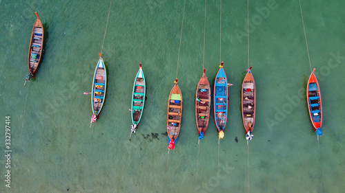 Aerial view of long tail boats along a tropical beach, Thailand © jovannig