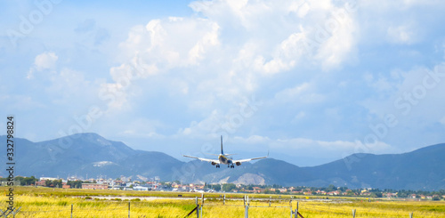 PISA, ITALY - JUN 1: Ryanair airplane lands in the main Tuscany airport, June 1, 2013 in Pisa, Italy. Ryanair is the major airplane low cost company in Europe