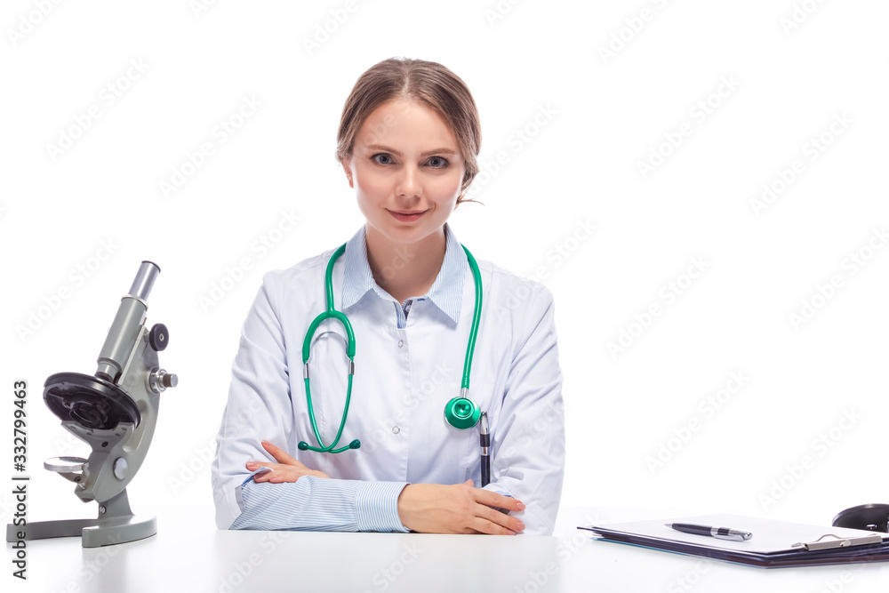 Portraif of Positive Caucasian Laboratory Researcher in Smock Working With Microscope While Conducting a Research. Portraif of Positive Caucasian Laboratory Researcher in Smock Working With Microscope While Conducting a Research.