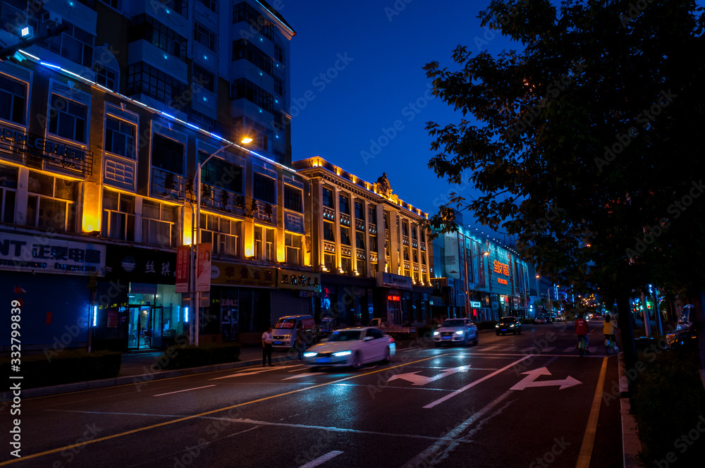 Fototapeta premium China, Heihe, July 2019: Night streets of the Chinese city of Heihe in the summer