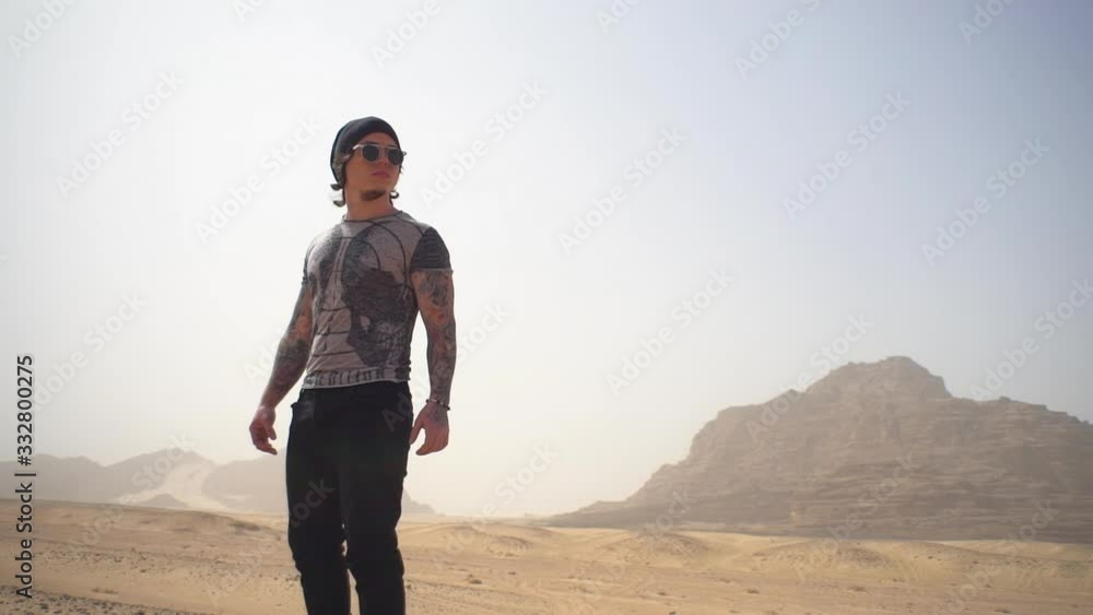 The guy goes through the desert, travels, heat, Sahara The guy goes through the desert, travels, heat, Sahara