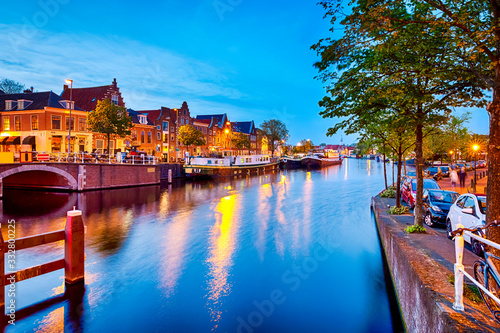 View of Harlem Sight on Spaarne River On The Background At twilight. photo