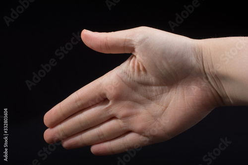 Five  fingers of a human hand partly seen in view photo