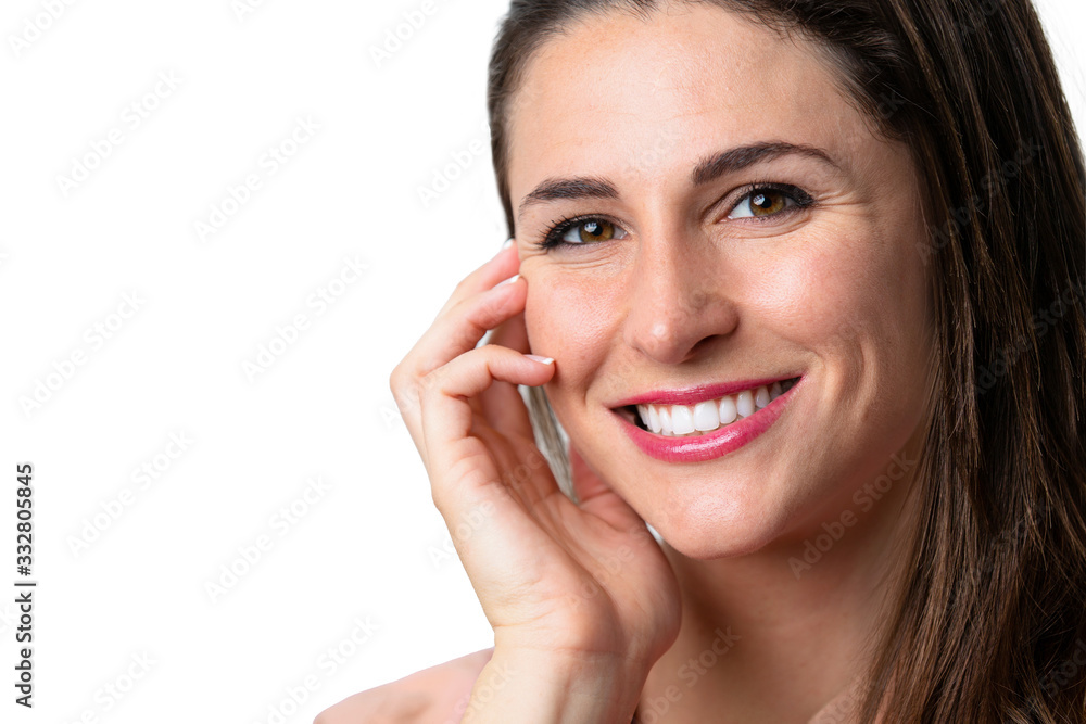 Beautiful female model with natural make-up and lipstick, white teeth, smiling with perfect skin complexion Beautiful female model with natural make-up and lipstick, white teeth, smiling with perfect skin complexion
