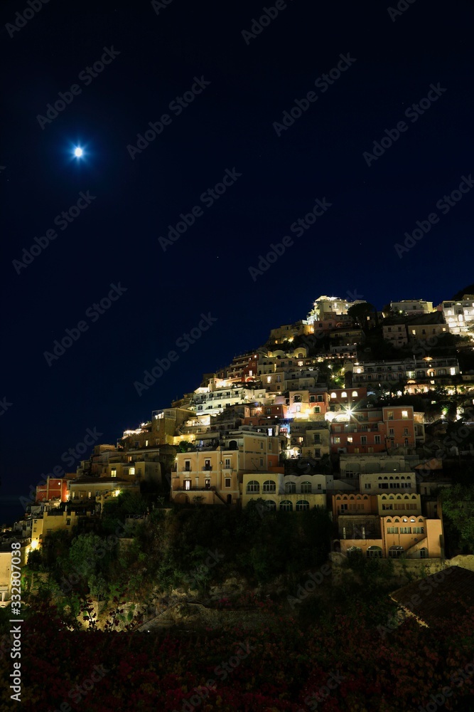 Positano Village along Amalfi Coast in Italy at dusk