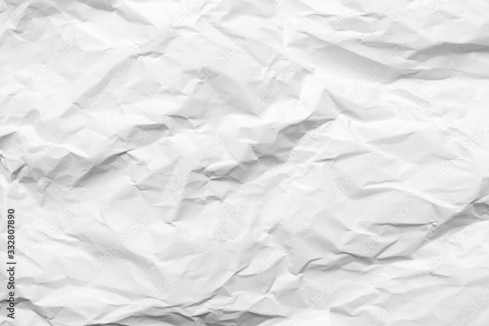 White crumpled paper texture background. Clean white paper. Top view. White crumpled paper texture background. Clean white paper. Top view.