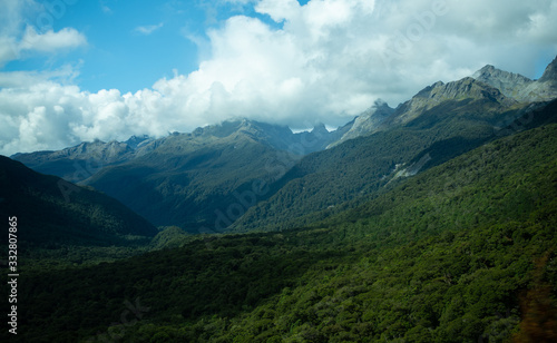 Clouds roll over mountains and forest in New Zealand