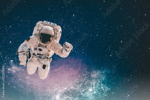 Fototapeta Naklejka Na Ścianę i Meble -  Astronaut in outer space. Elements of this image furnished by NASA.