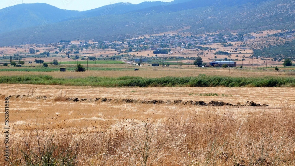 View of the battlefield of the famous battle of Plataea, on 479 BC, where the Greeks defeated the Persians, and the modern town, in Boeotia, Greece
