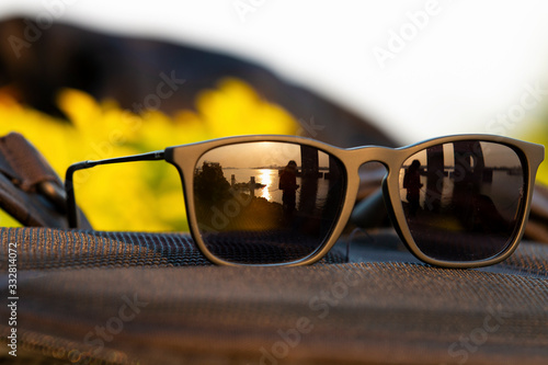 The reflection of the sun glasses