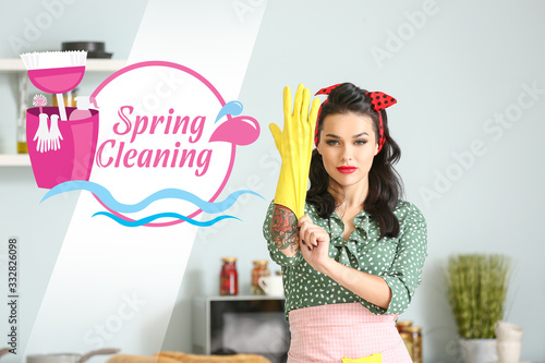 Portrait of beautiful pin-up woman going to clean kitchen